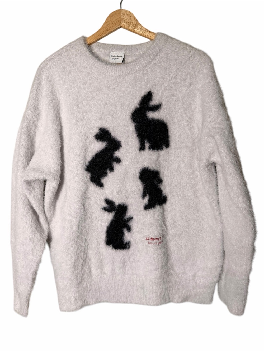 White Fuzzy Crewneck Sweater with Black Rabbit Motifs